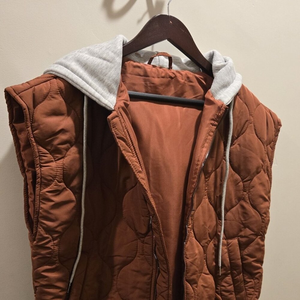 Women's Casual padded vests. Style with hood. Outdoor.
